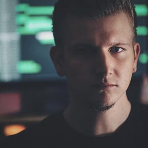 Soundstripe artist Cody Martin offers licensed music and looks into the camera with creative focus.