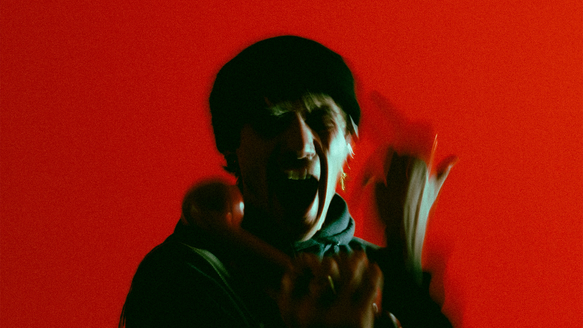 Man screaming in front of red background best scream sound effects