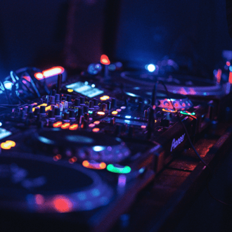 Studio DJ booth prepped for creating royalty free music for podcasts and soundtracks.